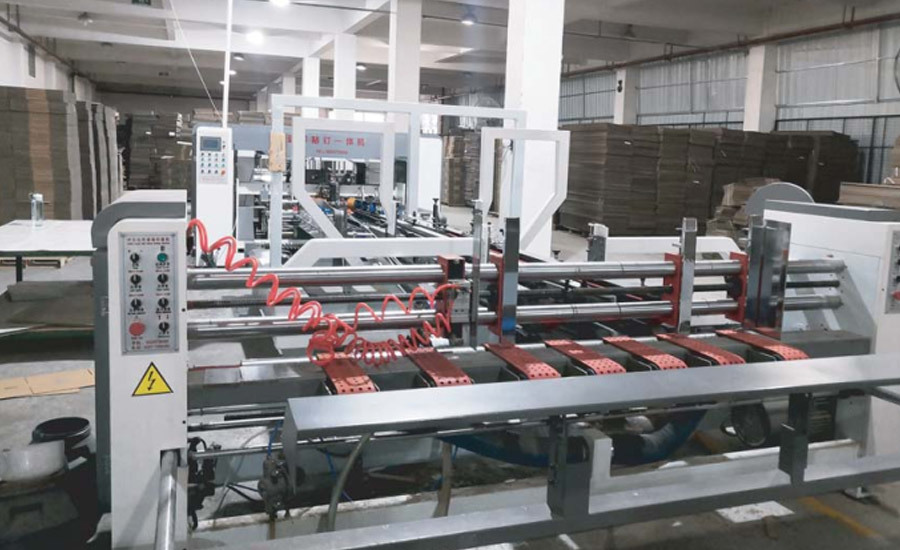 高(gao)速糊釘箱一體機(ji)